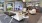 a clubroom with couches and tables