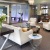 a clubroom with couches and tables