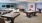 a clubroom with a pool table, tables and chairs